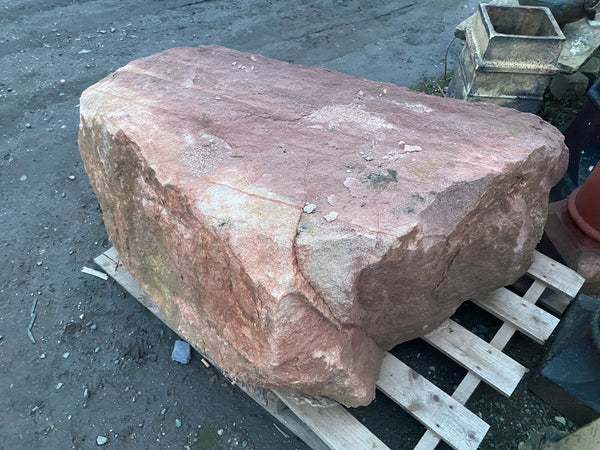 Reclaimed large red stone block