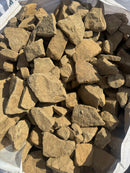 Yellow drystone sandstone walling