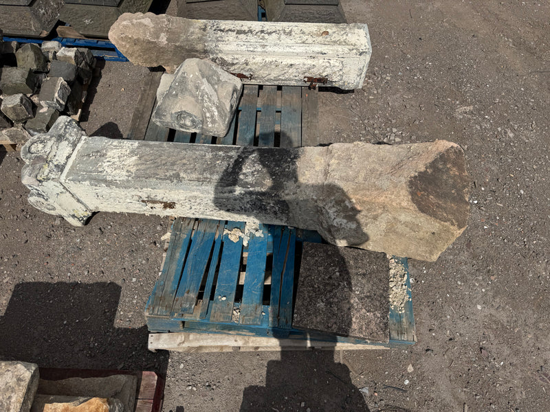 2 stone decorative gate pillars
