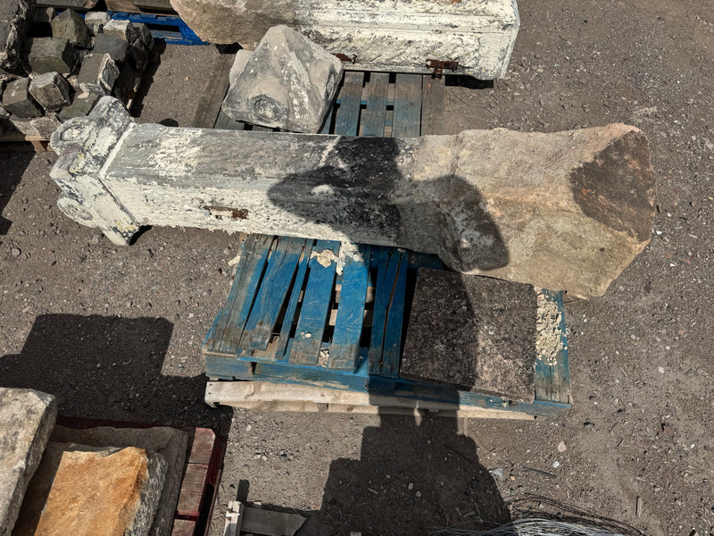 2 stone decorative gate pillars