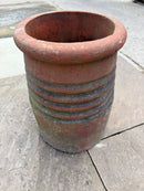 Terracotta ringed chimney pot